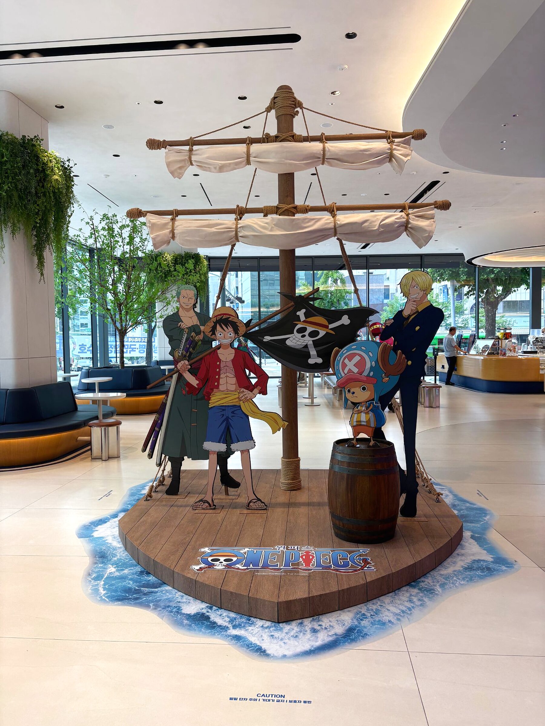 Ship-deck photo zone with Luffy, Zoro, Sanji and Chopper